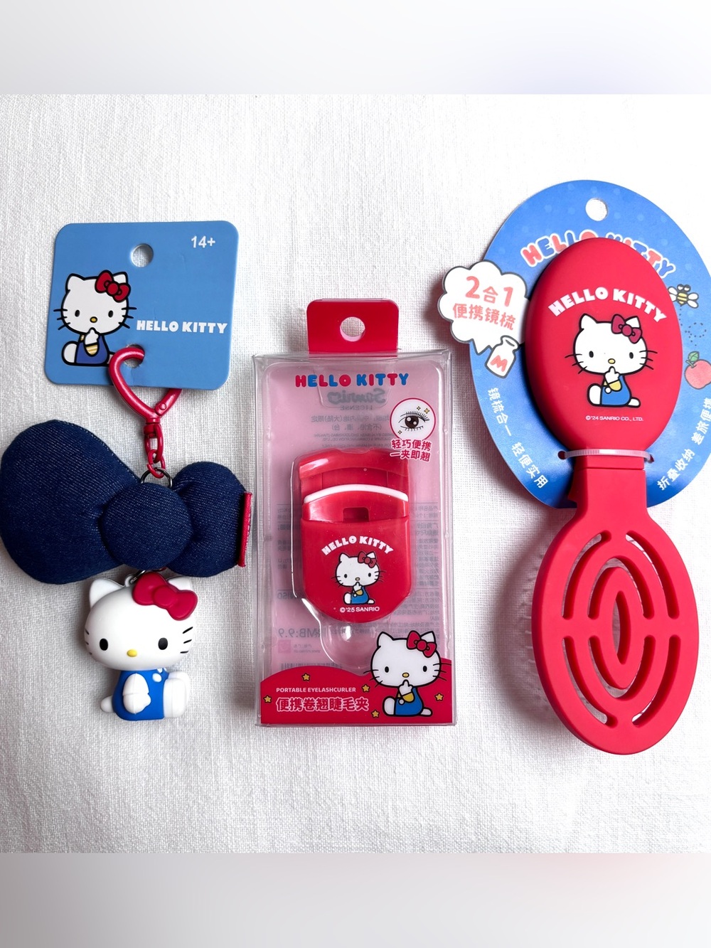 Hello Kitty Sanrio denim bow keychain eyelash curler portable mirror comb